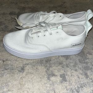 white adidas tennis shoes